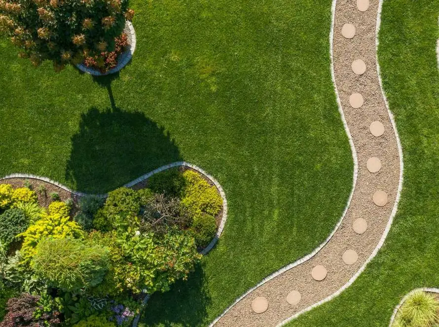 An aerial view of a beautifully manicured lawn, maintained by NJ United Land & Snow Management